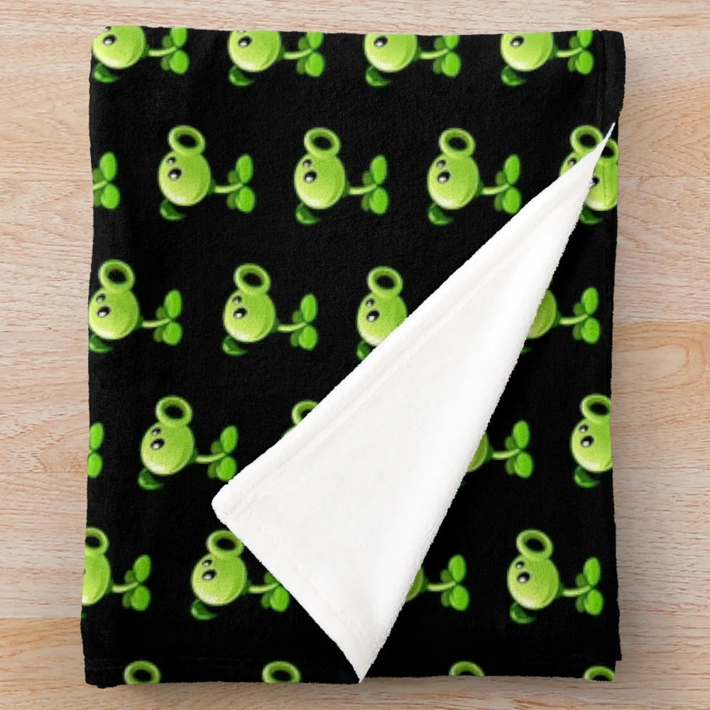 Pea plant plush blanket featuring a black background