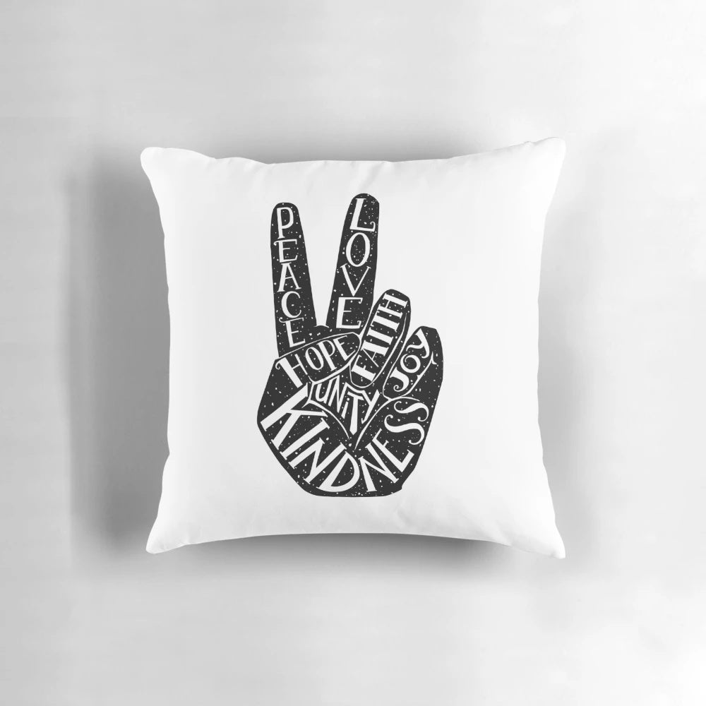 Peace sign with inspirational words on a decorative throw pillow