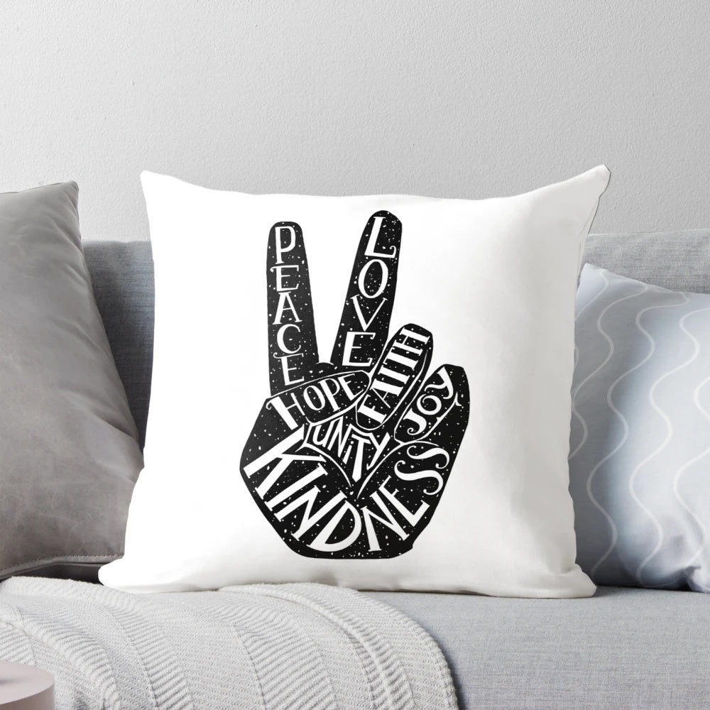 Peace sign with inspirational words on a decorative throw pillow