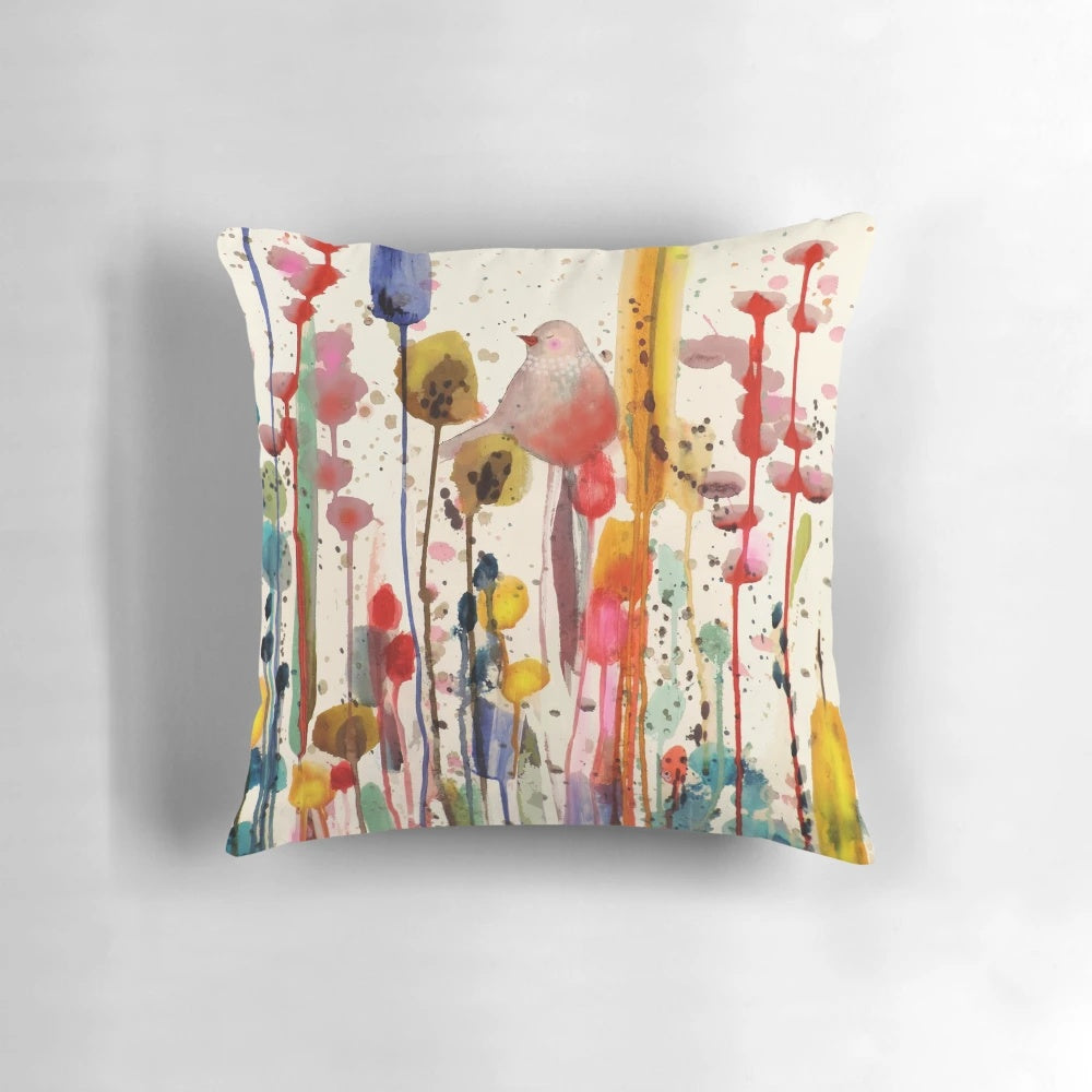 Soft, decorative pillow featuring a serene bird and flower nature scene in vivid colors