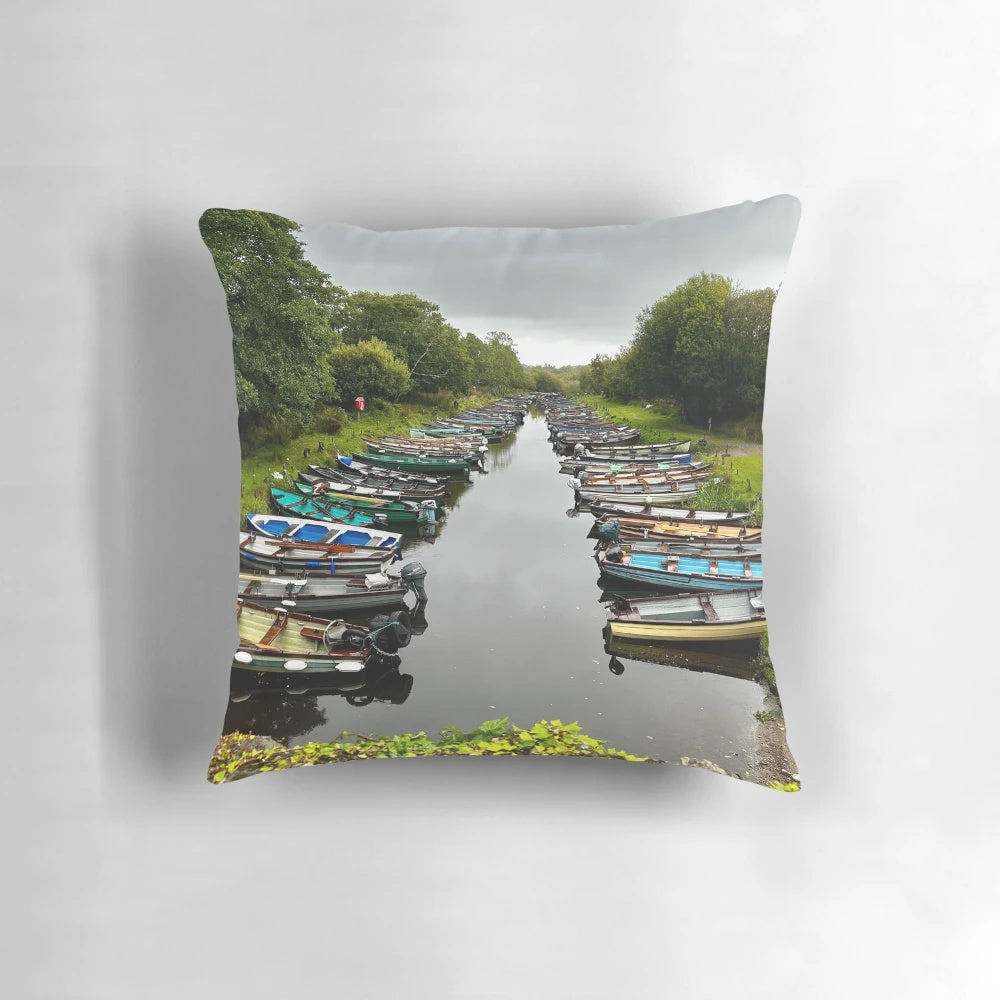 Peaceful image of fishing boats docked on a river or canal with the focus keyword "fishing boats