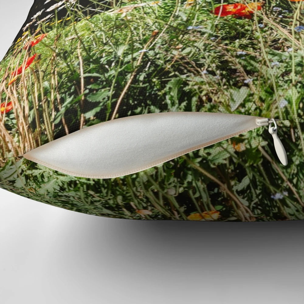 A cozy mountain garden pillow featuring vibrant wildflowers and a serene landscape.