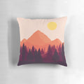 A soft, plush pillow featuring a scenic mountain landscape at sunset.