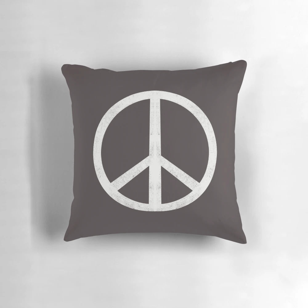 Peaceful Pillow with a Woodblock Print Design Featuring a Peace Sign and Earthy Tones
