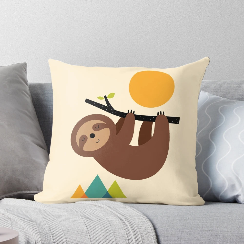 Cozy pillow featuring a sleeping sloth in a serene nature landscape