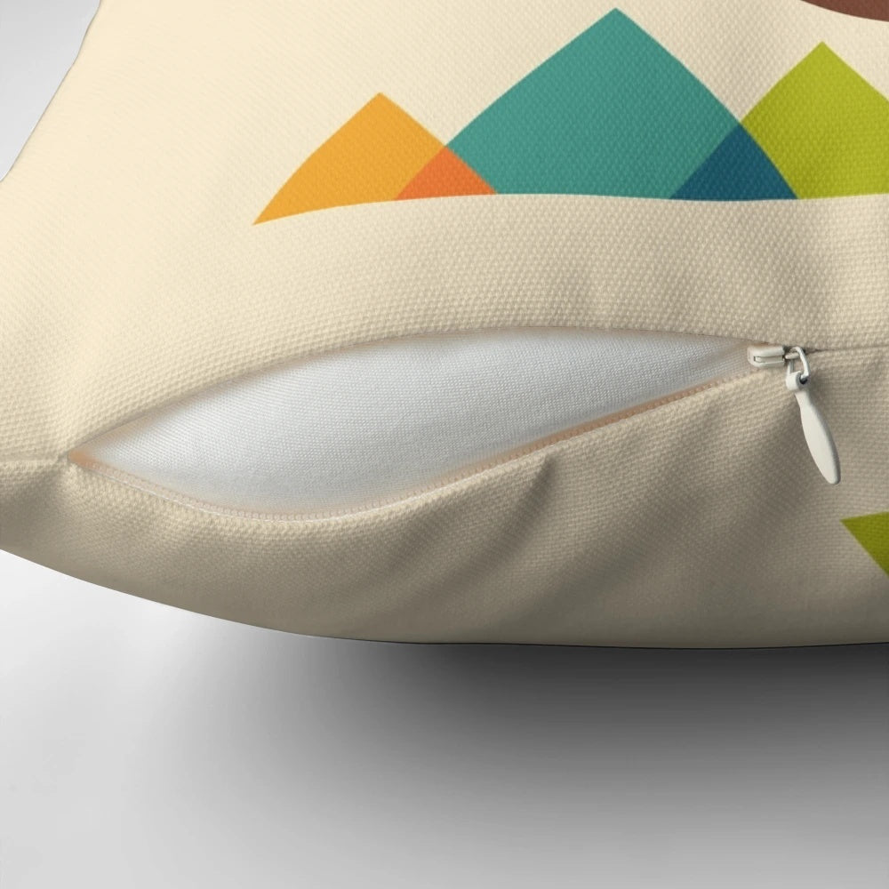 Cozy pillow featuring a sleeping sloth in a serene nature landscape