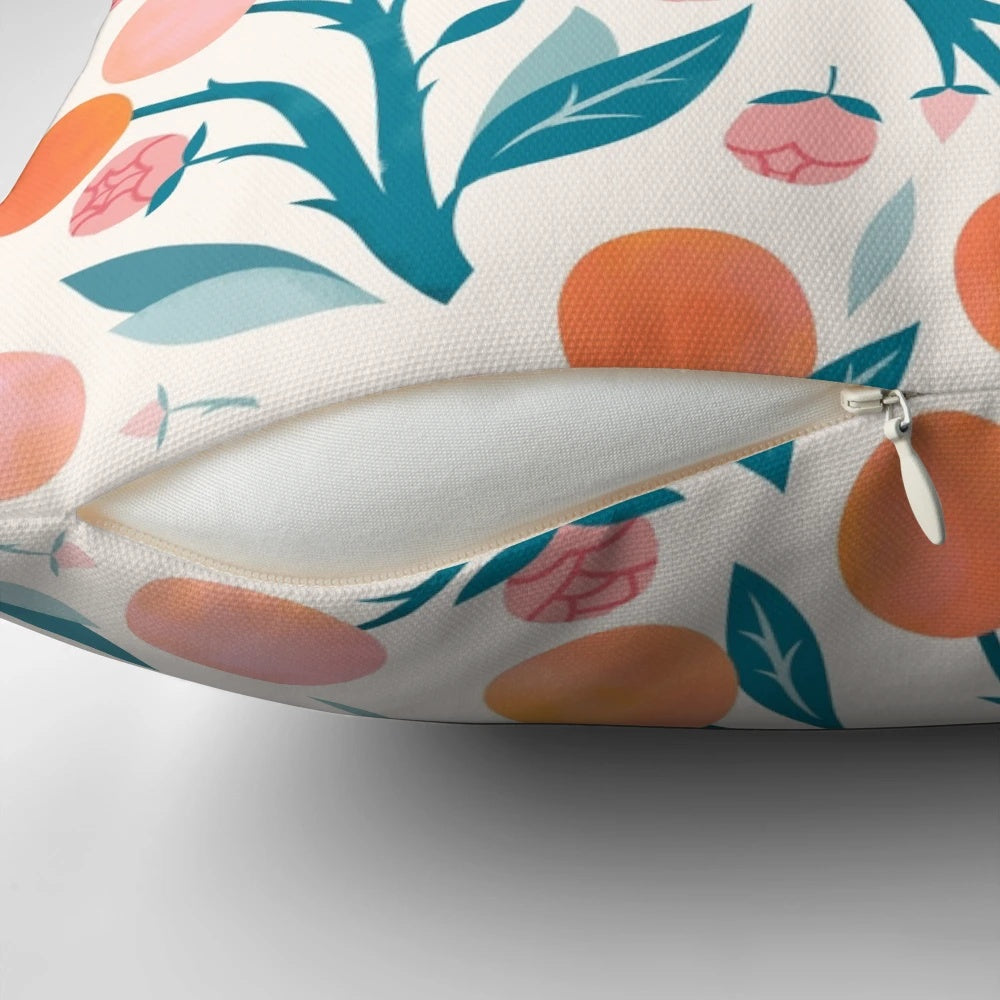 Peach and peony botanical decorative pillow with a fresh, summery design