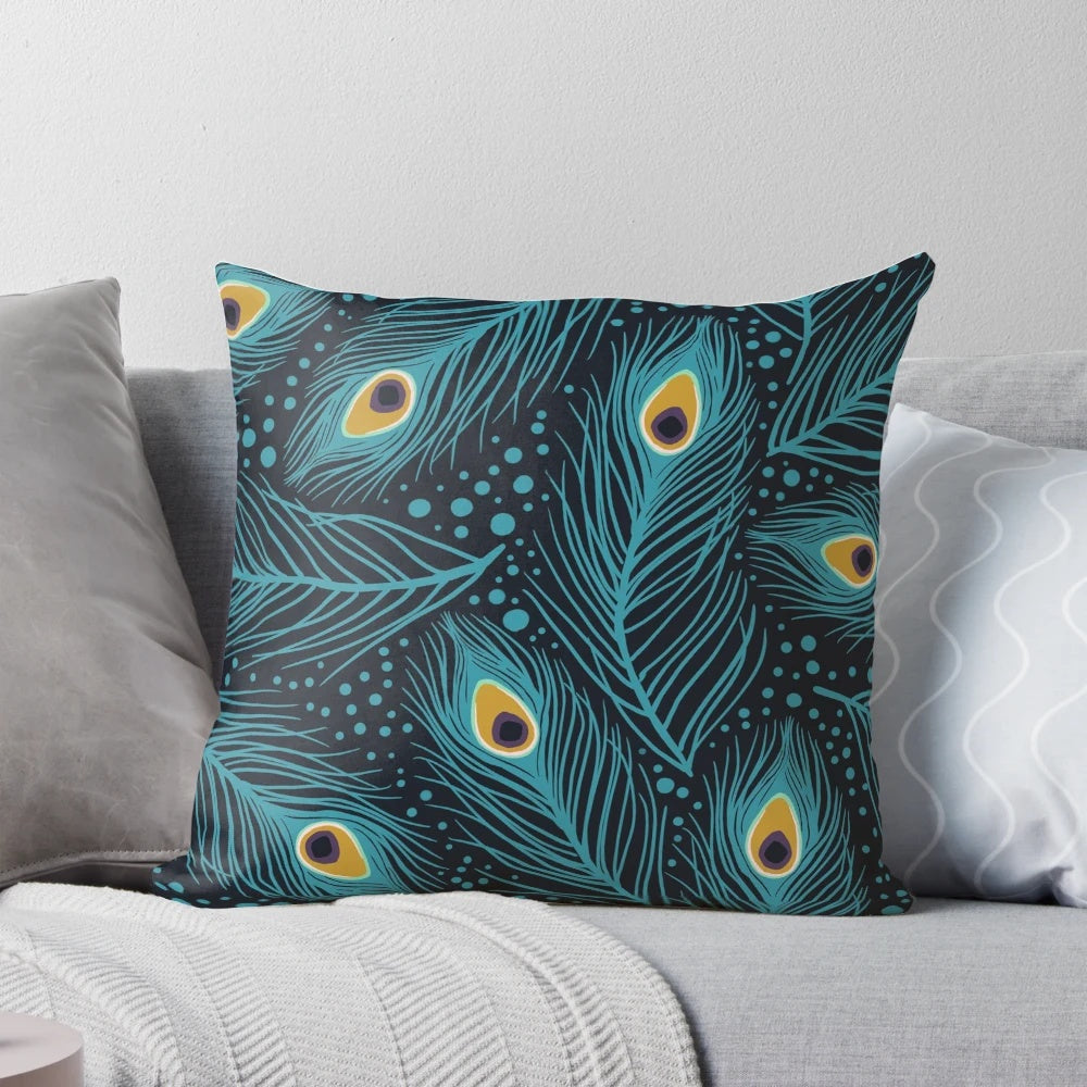 Vibrant peacock feathers arranged on a soft, plush pillow for a nature-inspired touch to any room.
