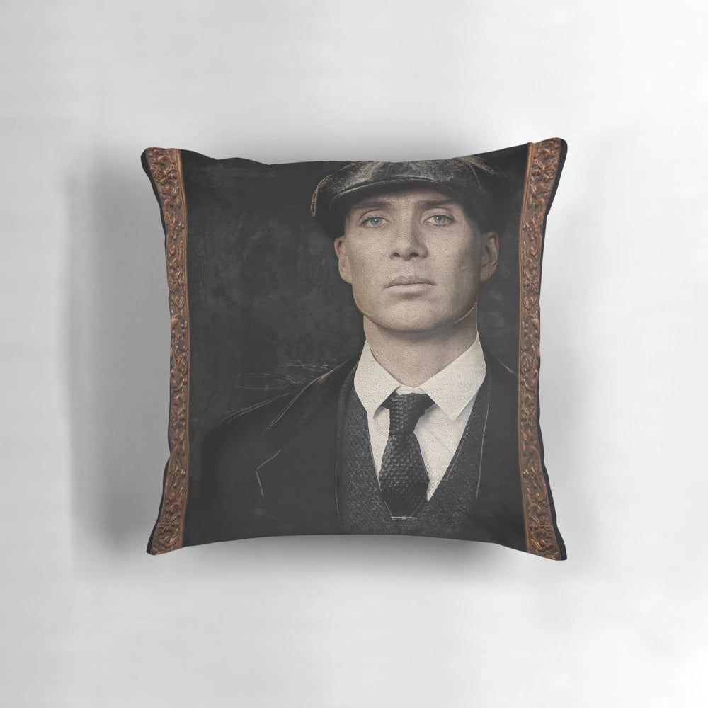A cozy throw pillow featuring a portrait of Thomas "Tommy" Shelby, the iconic character from the Peaky Blinders TV series, played by actor Cillian Murphy.