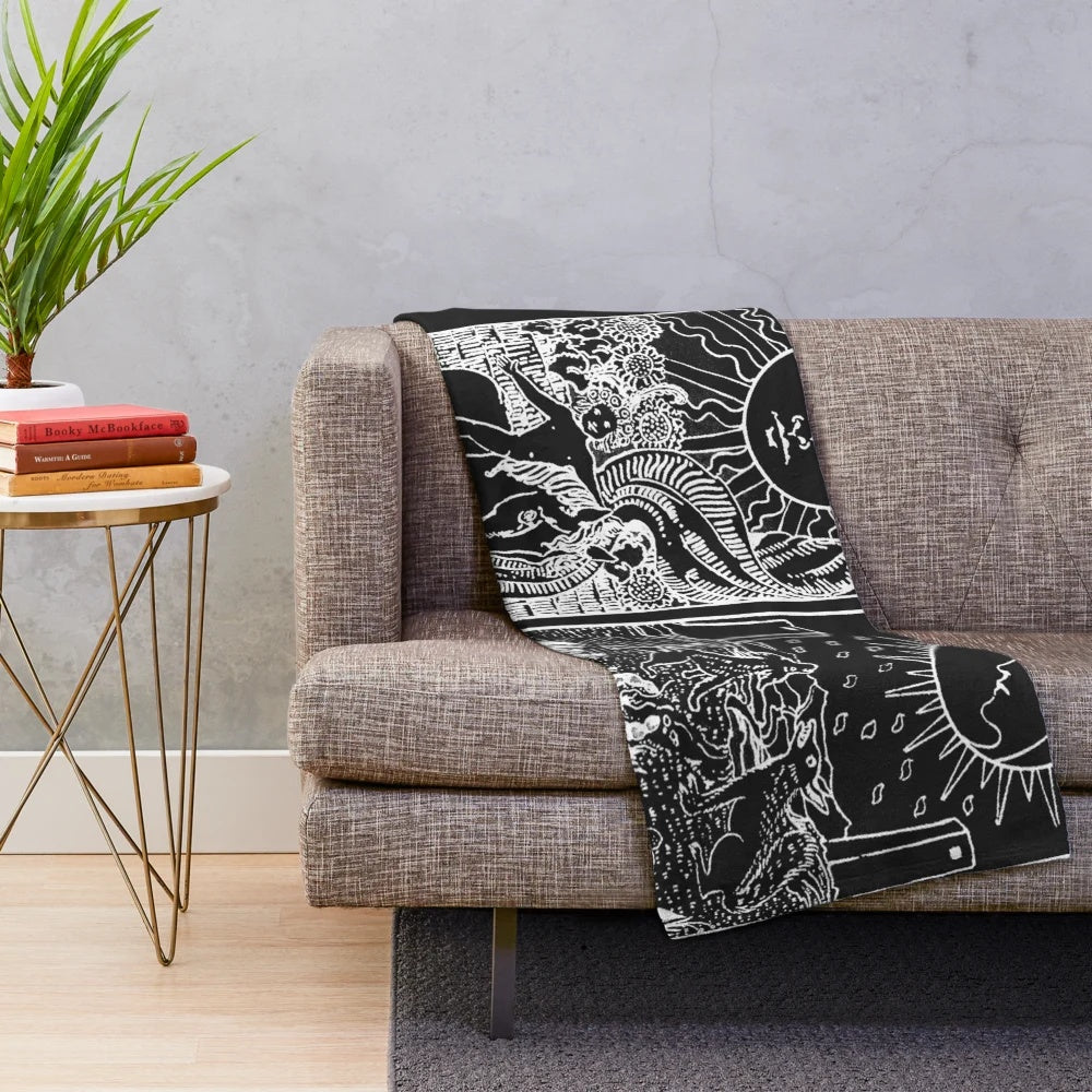 Plush blanket featuring a sun and moon tarot card design in pearl and obsidian colors