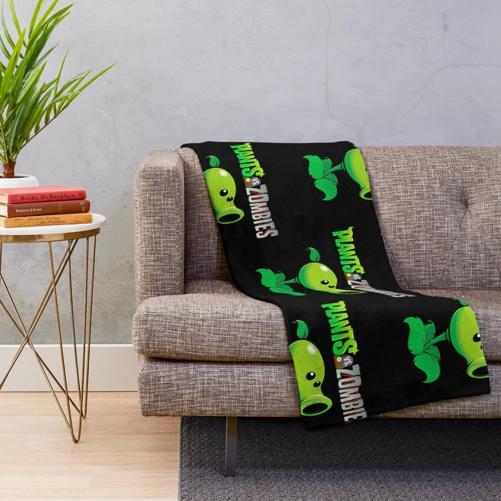 Peashooter-inspired plush blanket featuring the iconic Plants vs Zombies character