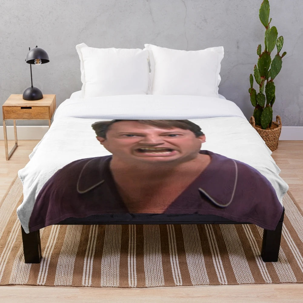 Mark Corrigan from Peep Show on a plush Christmas blanket