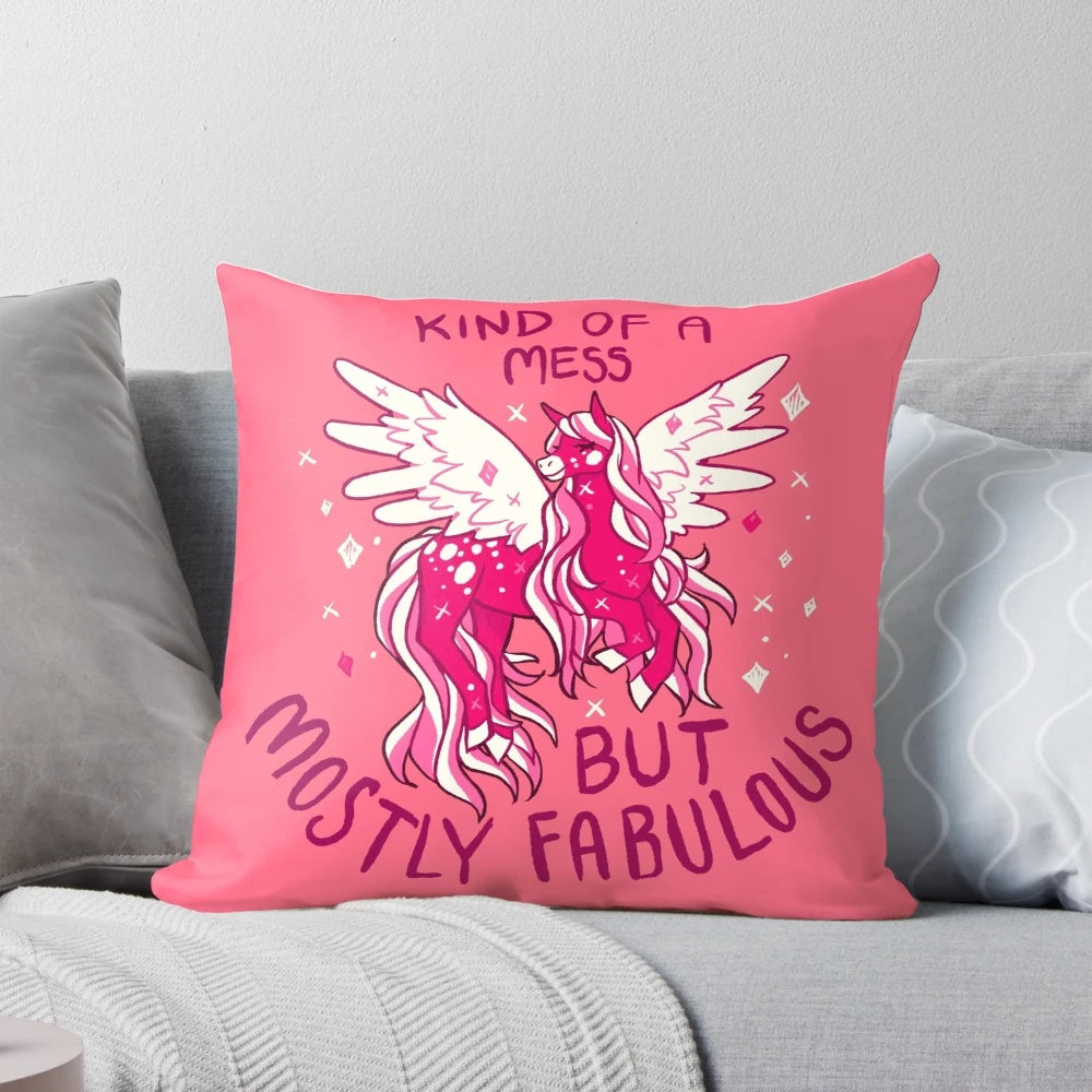 A pink and sparkly pegasus-themed pillow with the text "KIND OF A MESS" on it, representing self-love and acceptance.