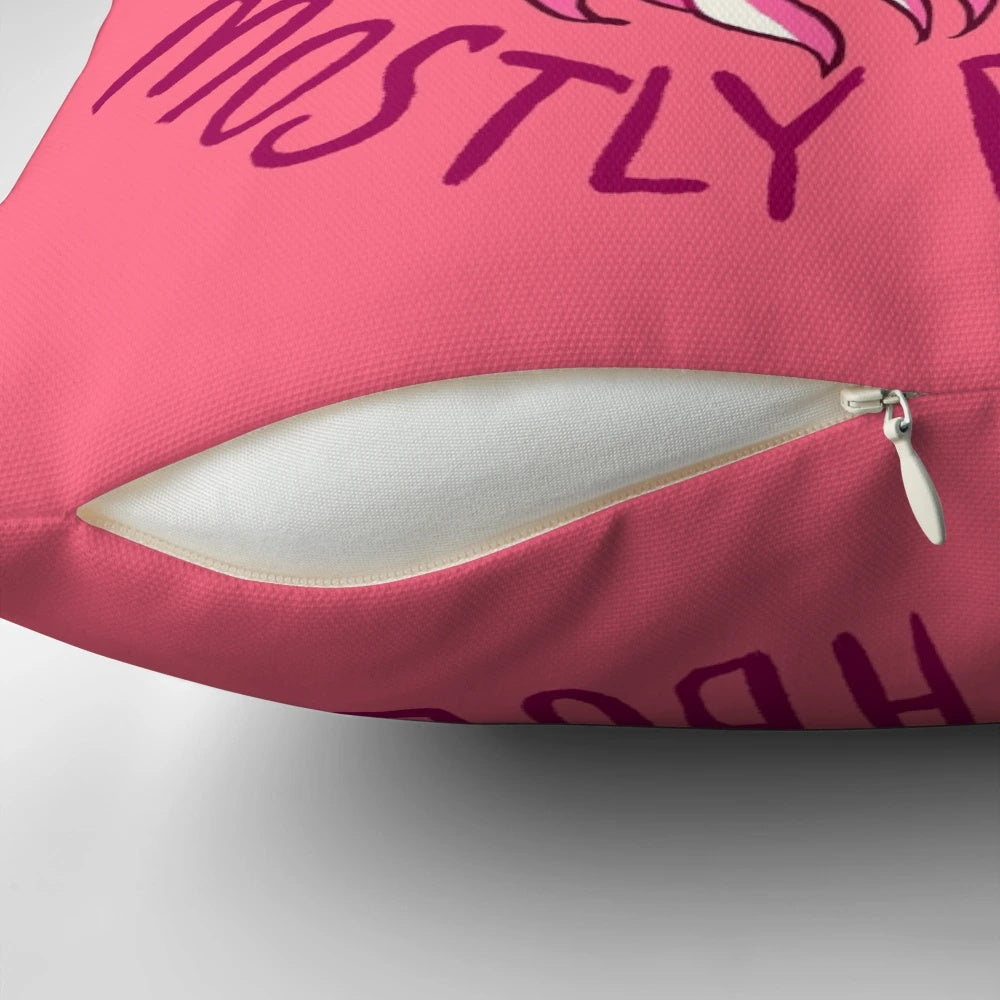 A pink and sparkly pegasus-themed pillow with the text "KIND OF A MESS" on it, representing self-love and acceptance.