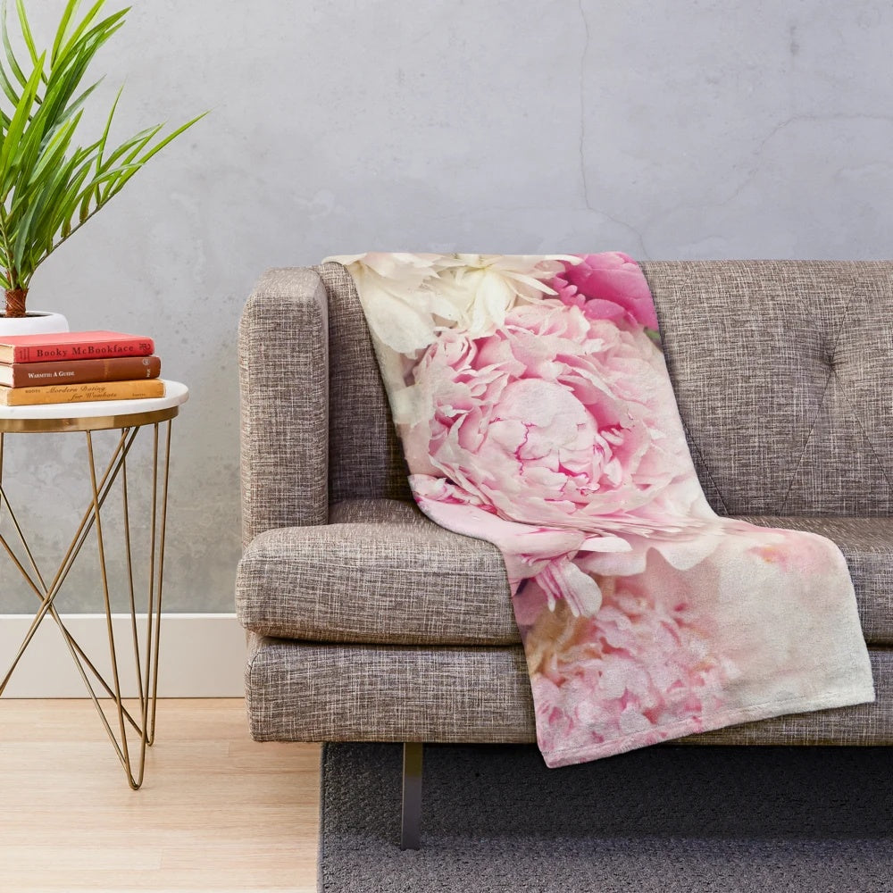 Peonies floral pattern on a white plush blanket