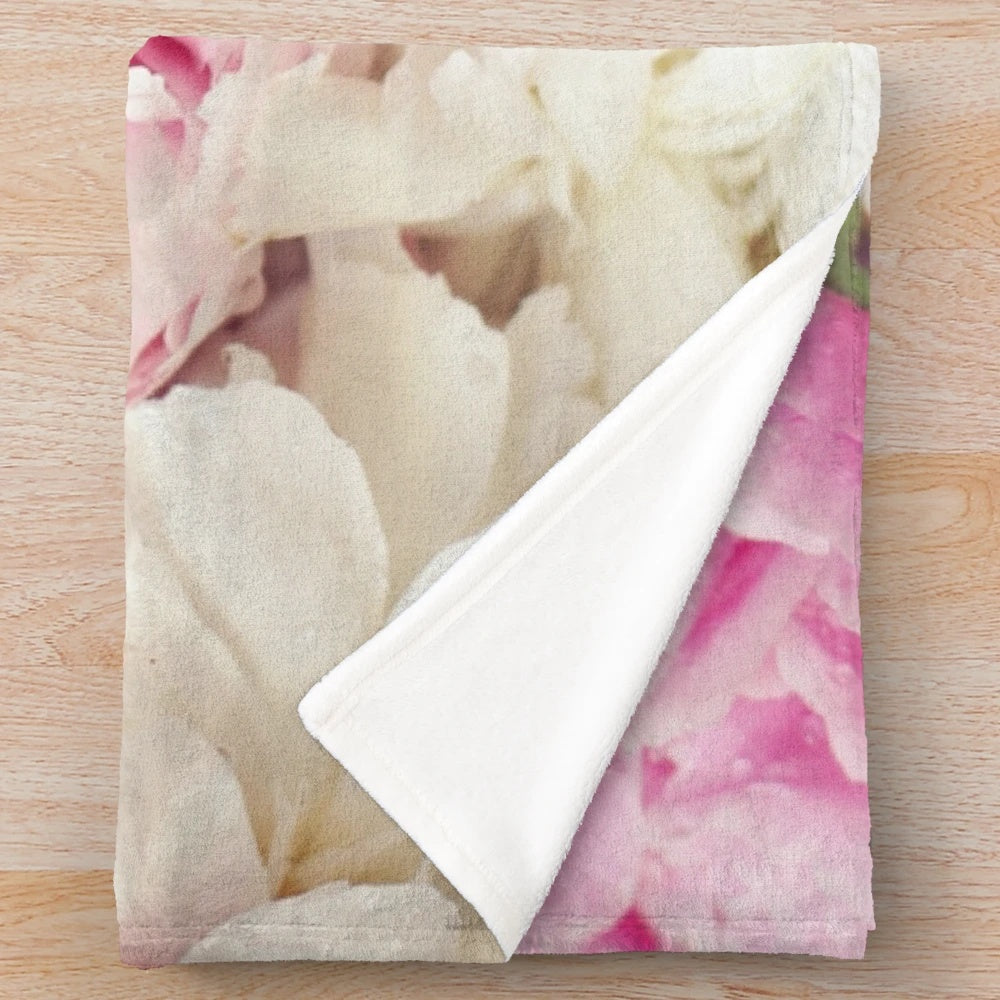 Peonies floral pattern on a white plush blanket