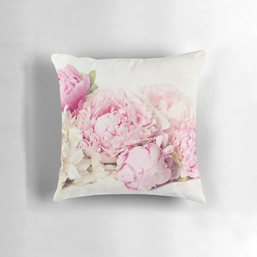 Peony flowers in bloom on a white pillow, a shabby chic home decor accent.