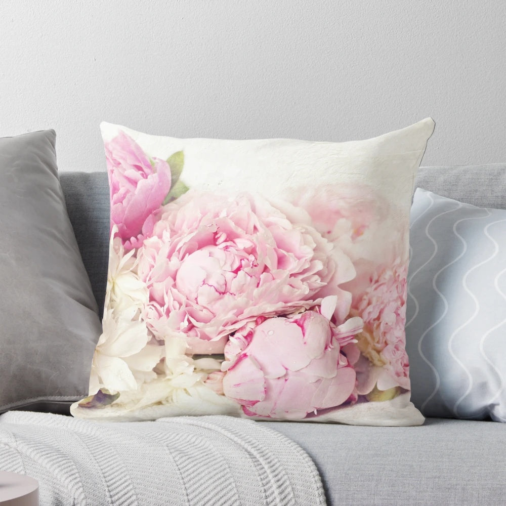 Peony flowers in bloom on a white pillow, a shabby chic home decor accent.
