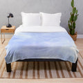Periwinkle plush blanket with a watercolor design