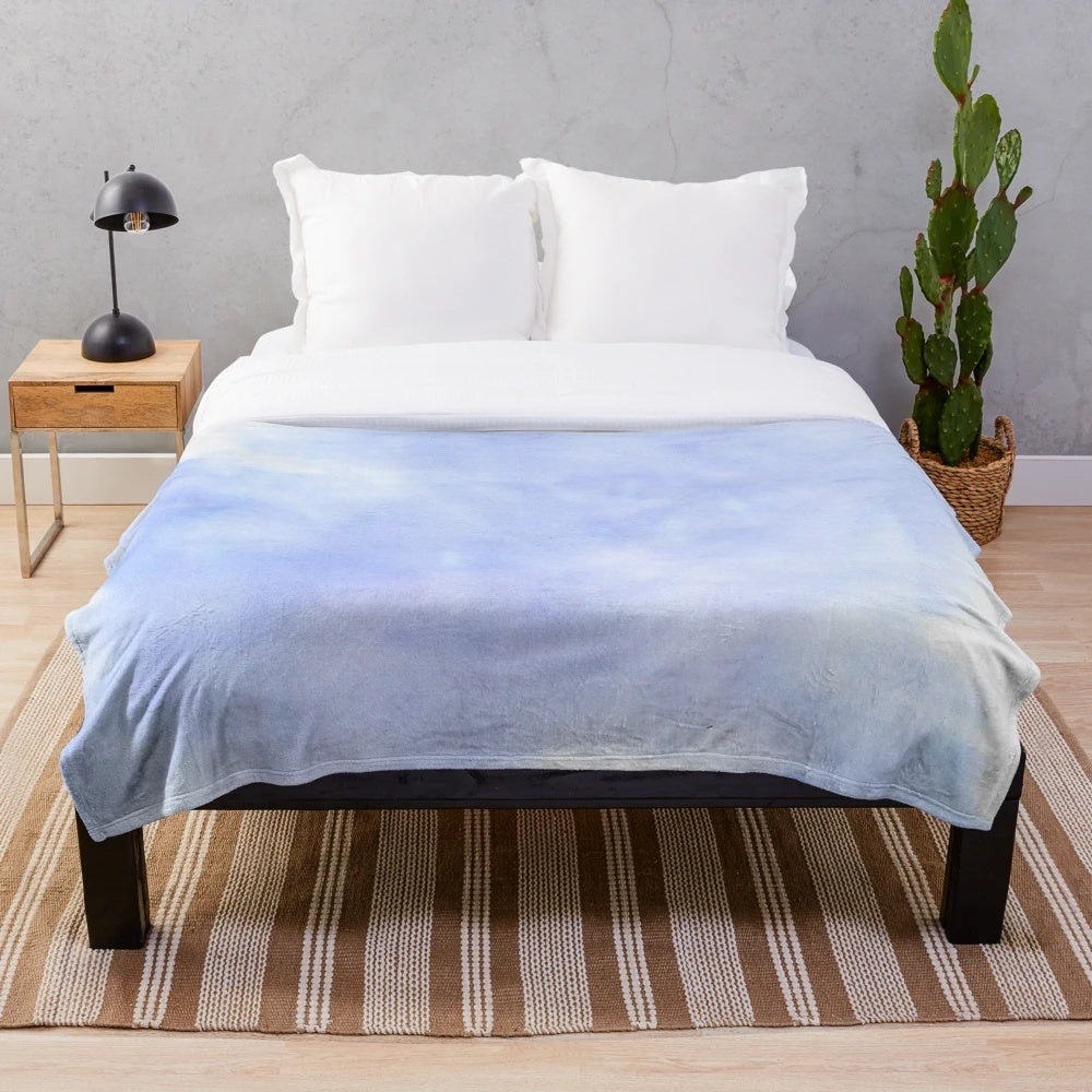 Periwinkle plush blanket with a watercolor design