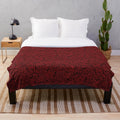 Persona 5-inspired plush blanket with a star pattern design in red and black colors