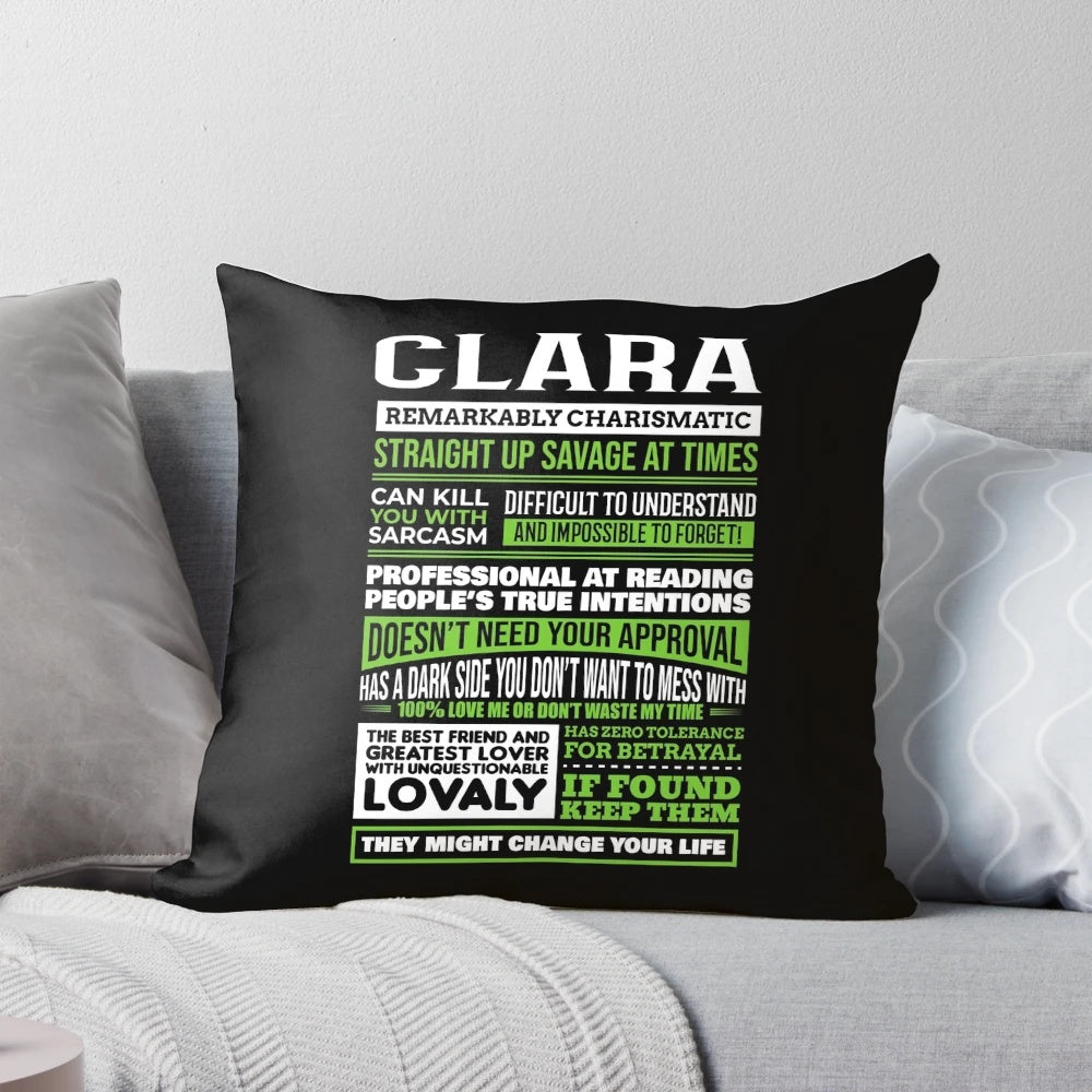 Decorative throw pillow featuring the name "Clara" and its meaning or definition