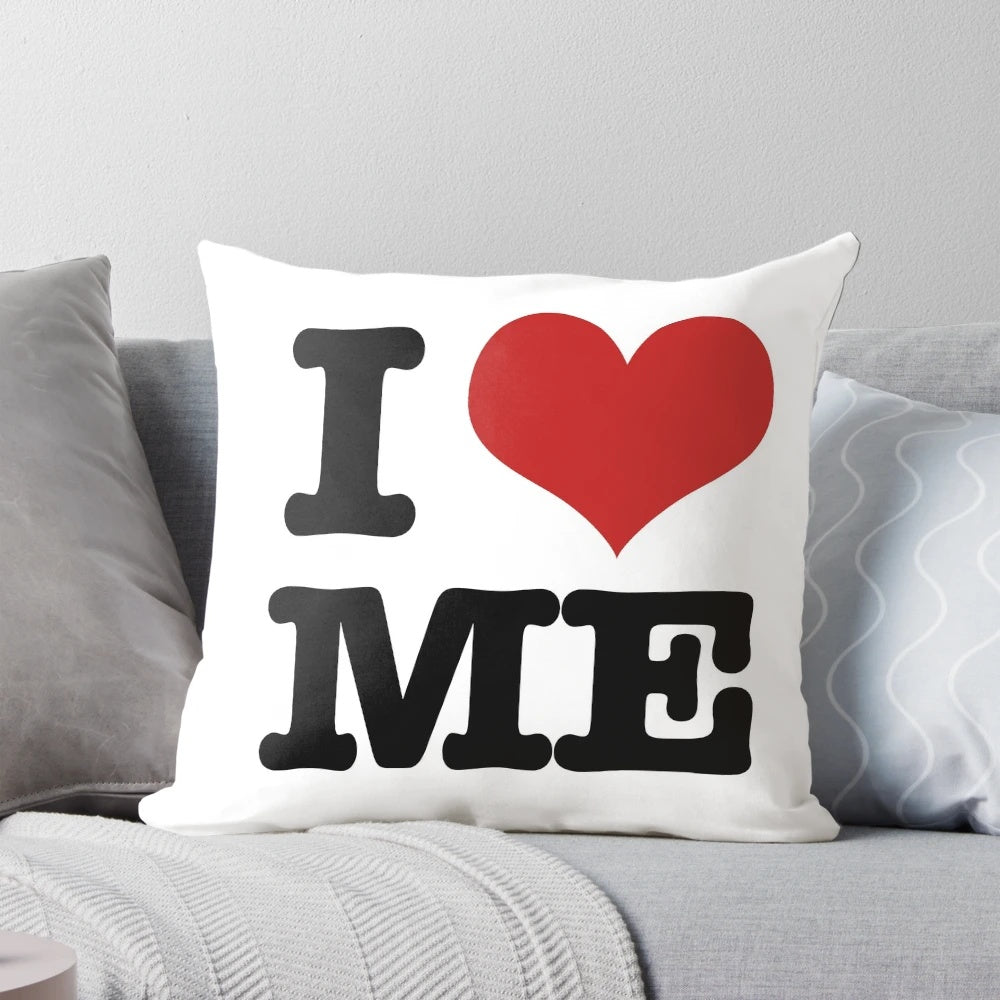 A heart-shaped pillow with the text "I Love Me" printed on it, representing self-love and self-care.
