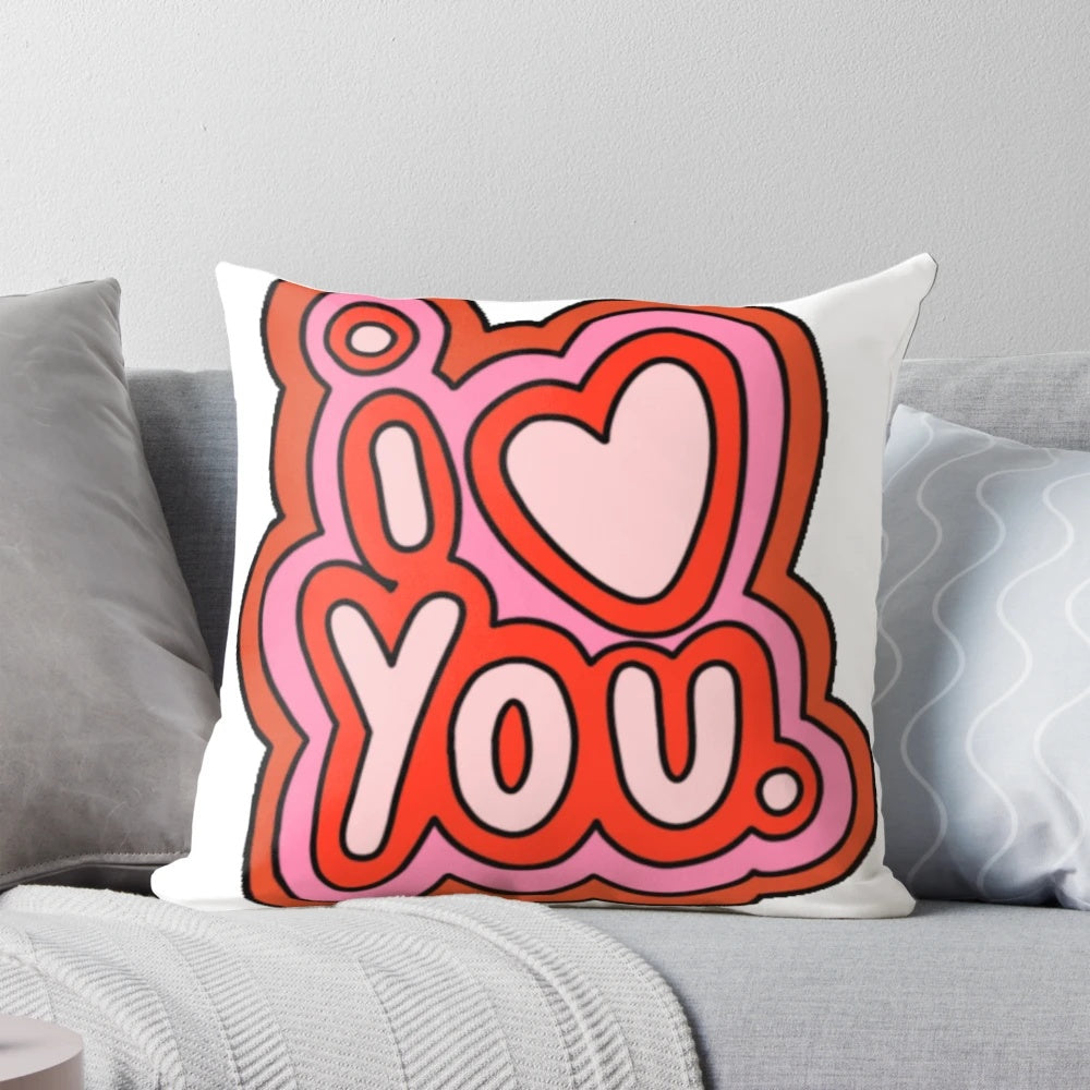 Soft, plush pillow with a heart design and the words "I Love You" printed on it.