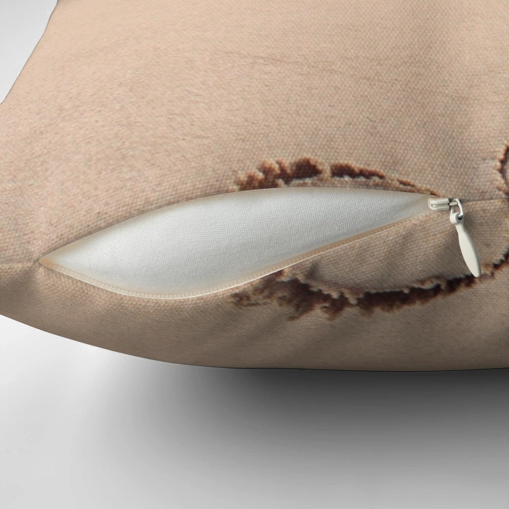 Soft, sand-inspired memorial pillow with heartfelt design for grieving and healing