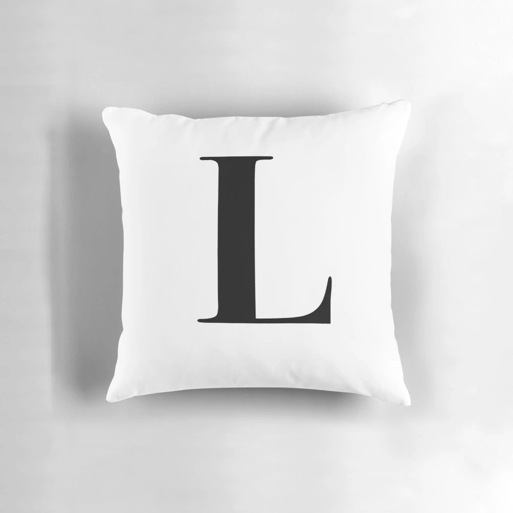 Monogram initial pillow with the letter L in a stylish typography
