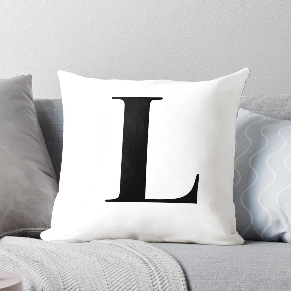 Monogram initial pillow with the letter L in a stylish typography
