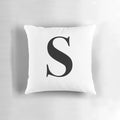 Plush monogram pillow with the letter S, perfect for adding a personal touch to your decor.