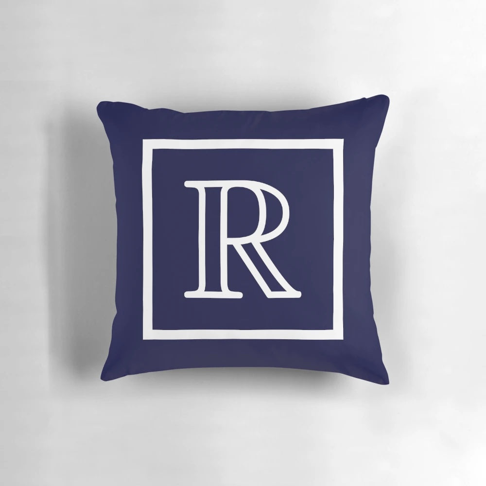 Navy blue and white square monogram R pillow from Rew Studio