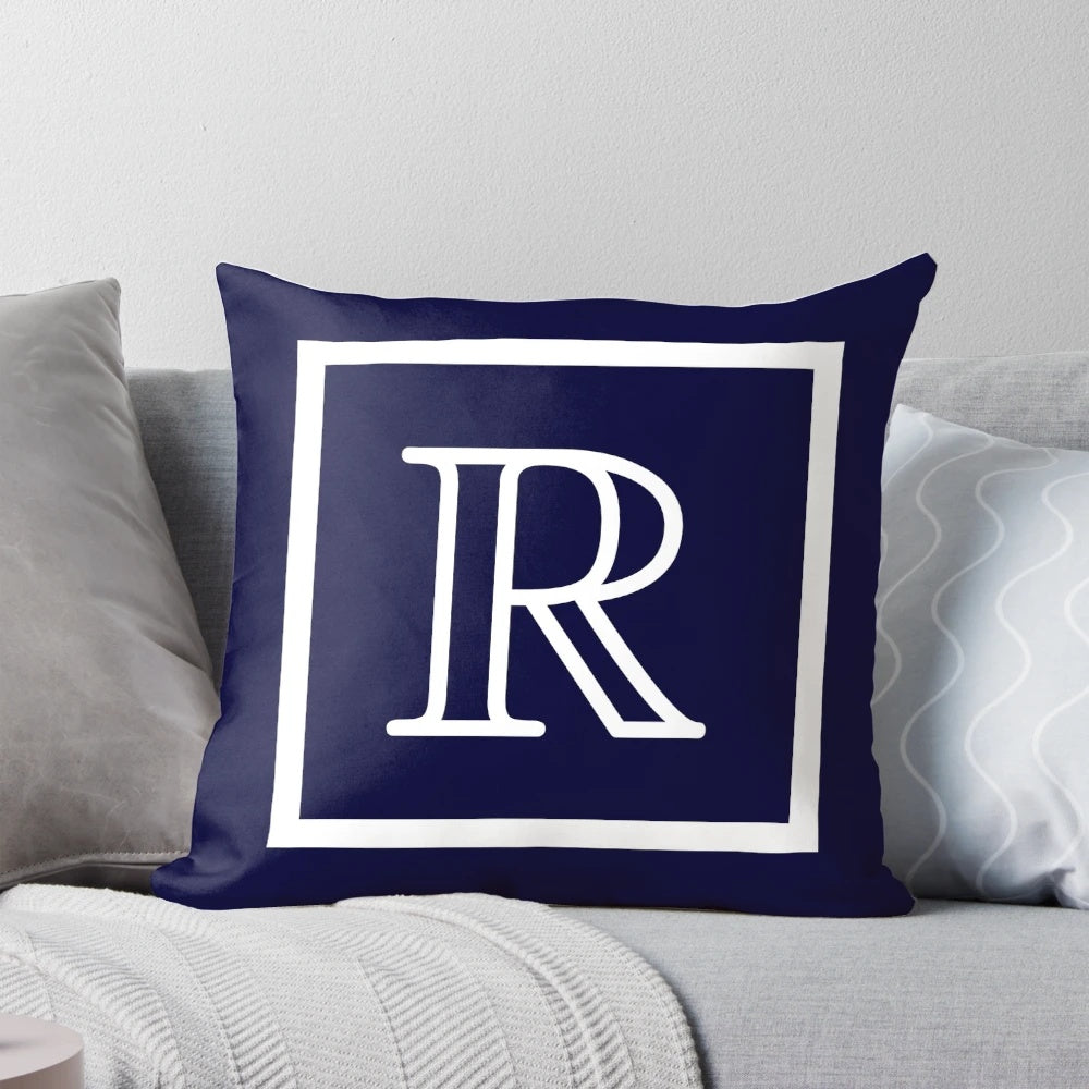 Navy blue and white square monogram R pillow from Rew Studio