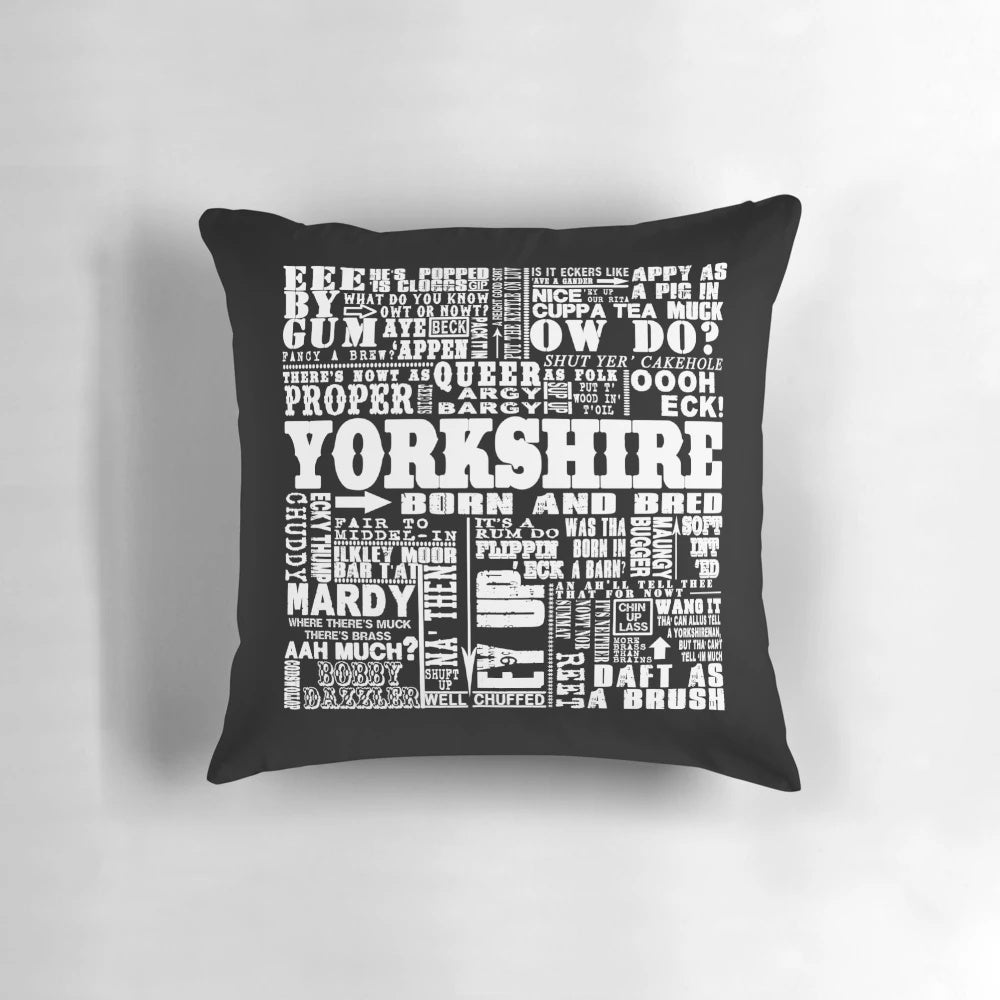 Vintage-style YORKSHIRE SAYINGS text on a decorative pillow