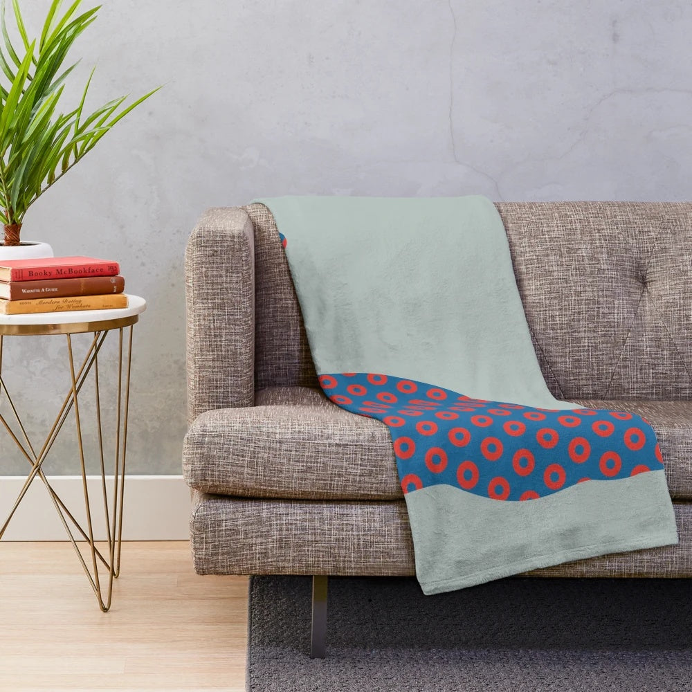 Phish-themed plush blanket featuring cat and donut design