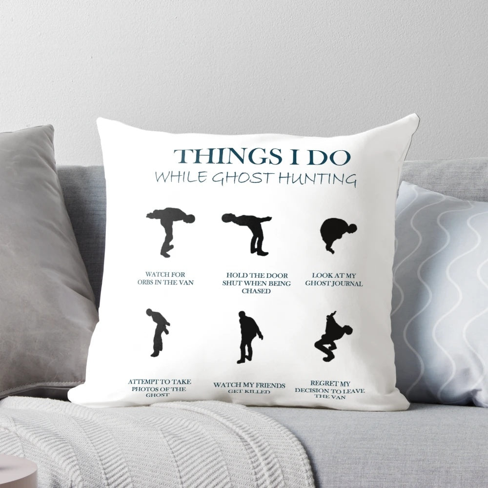 Phasmophobia ghost hunting pillow with illustrations of ghost hunting equipment and paranormal activity