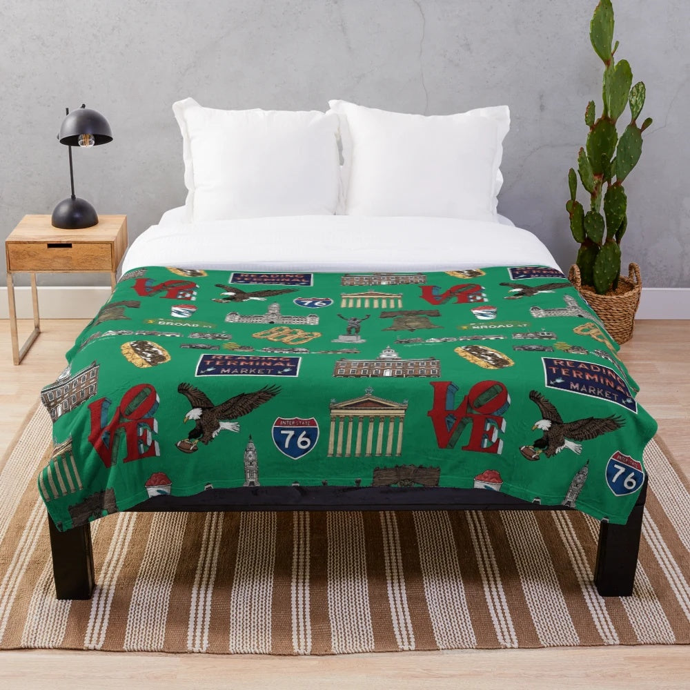 Kelly green plush blanket with Philly pattern design