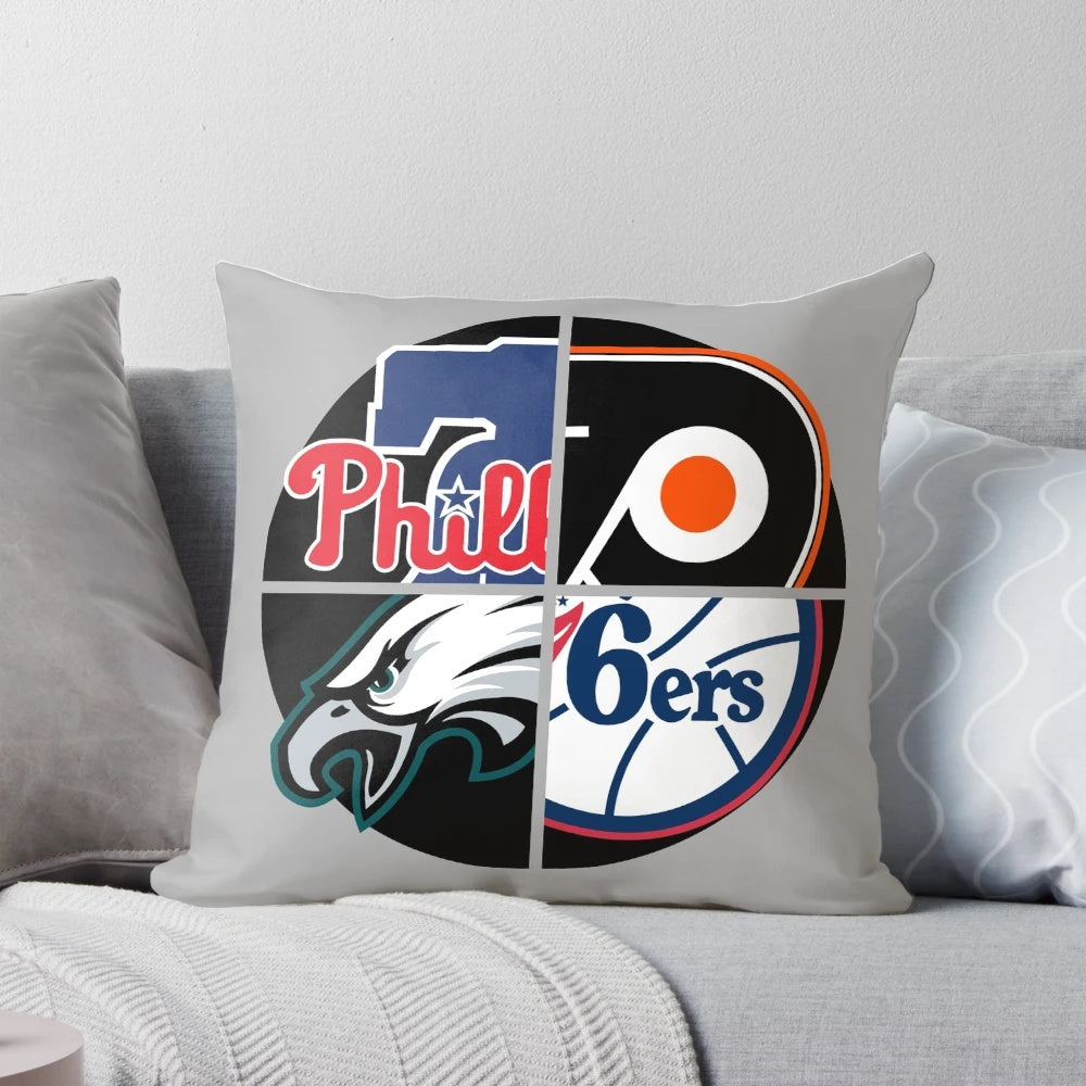 Philly sports-themed pillow in team colors with logo designs