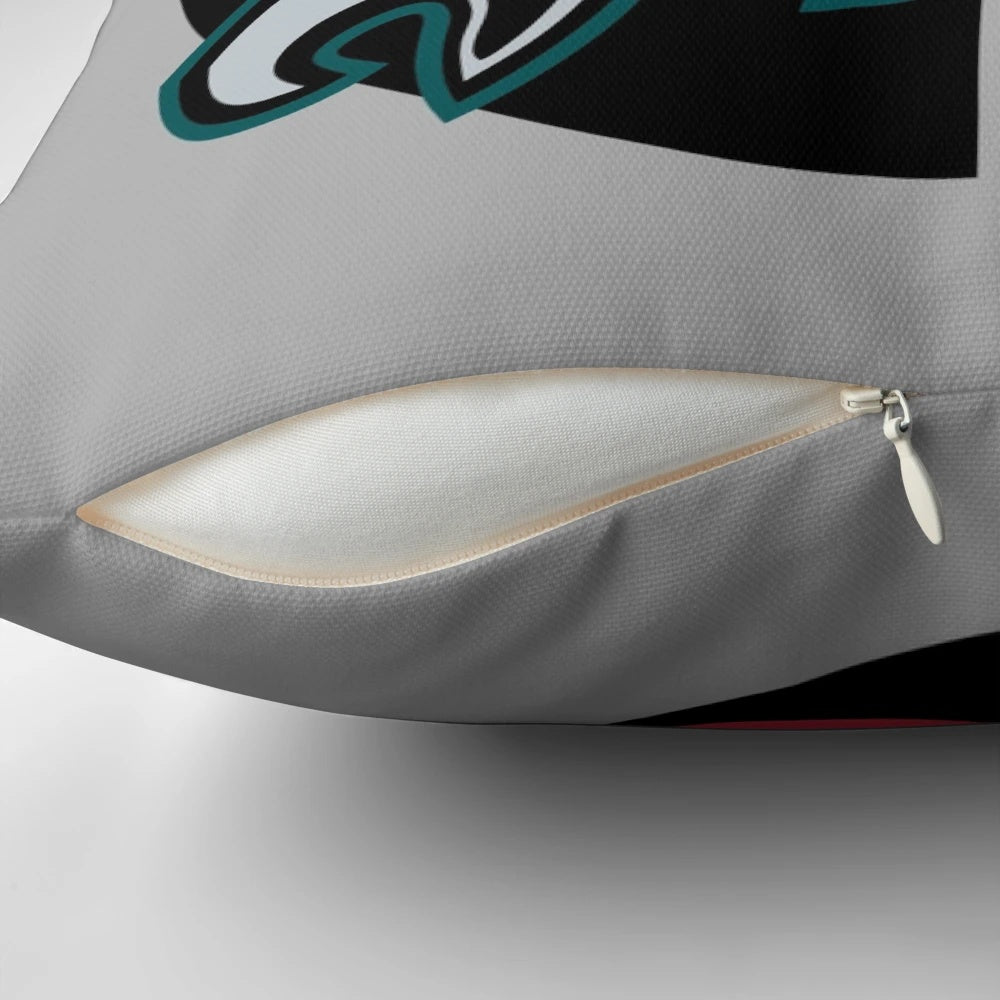 Philly sports-themed pillow in team colors with logo designs