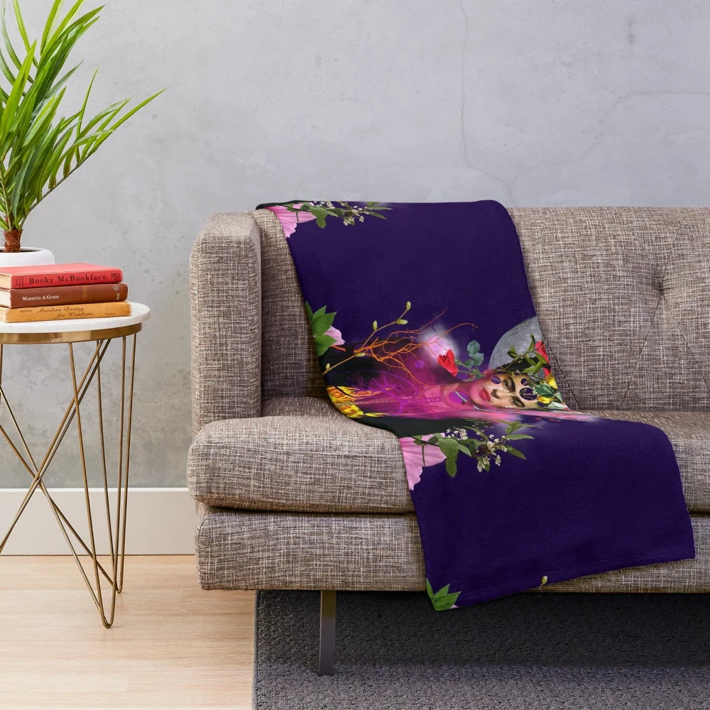 Frida Kahlo inspired plush blanket with surreal floral and moon imagery
