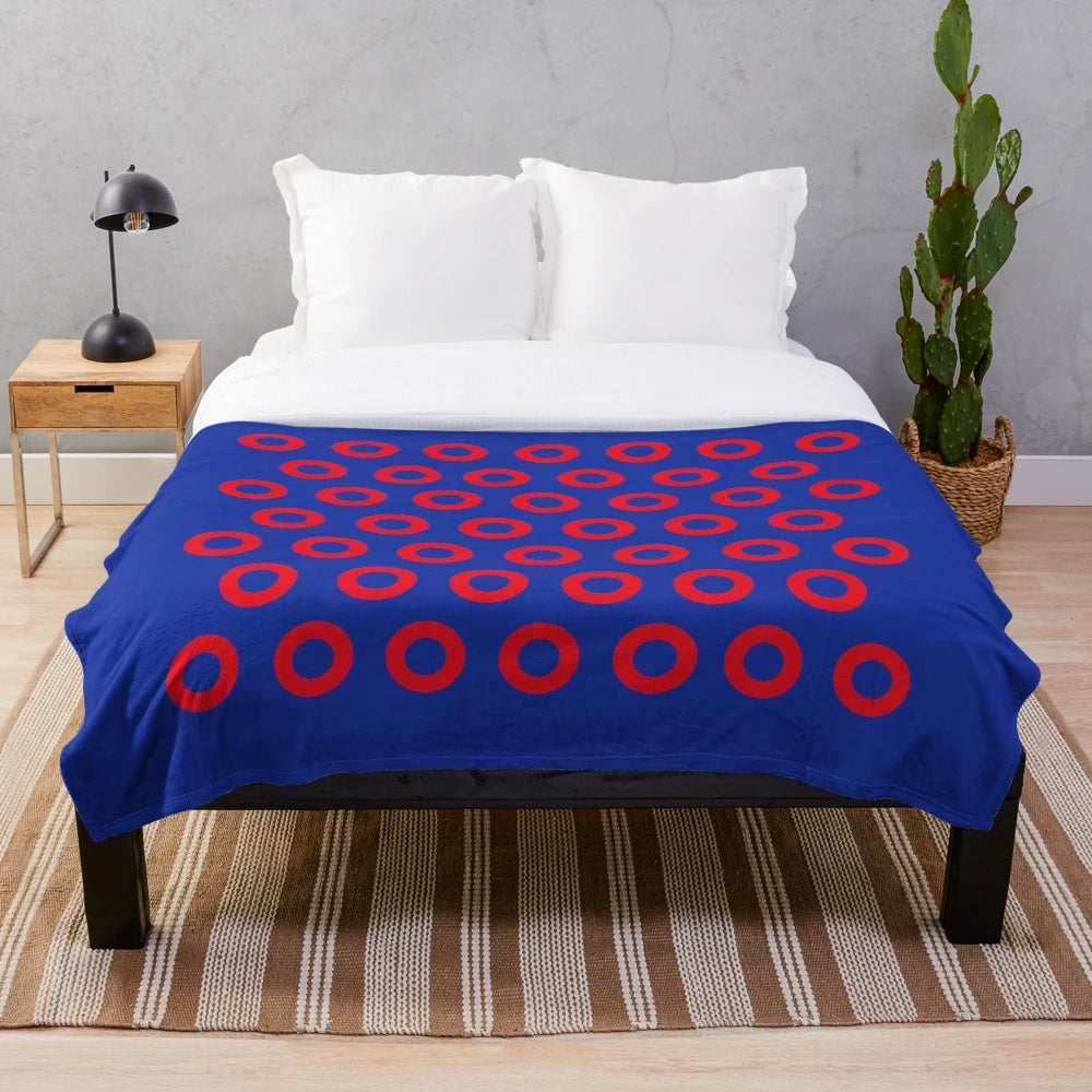 Plush blanket with red circle design inspired by Phish drummer Jon Fishman