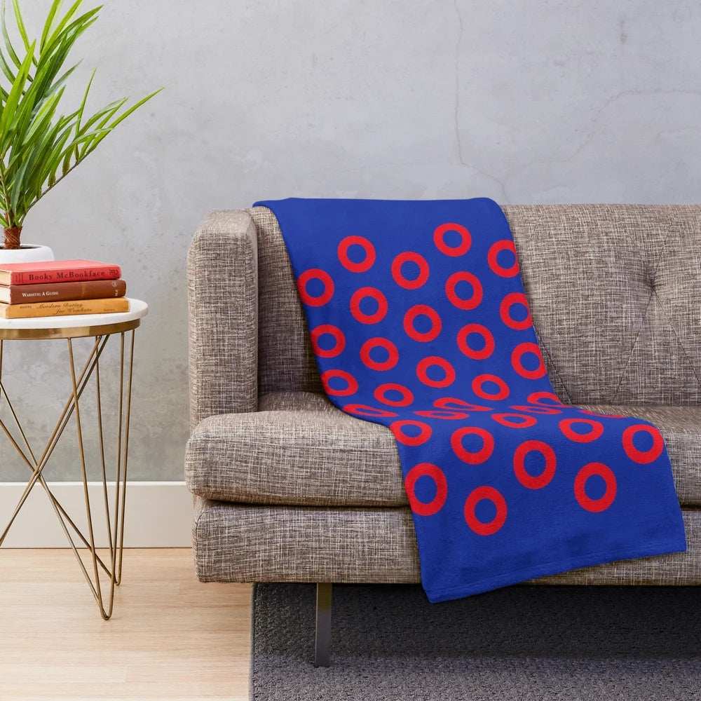 Plush blanket with red circle design inspired by Phish drummer Jon Fishman