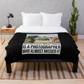 Photography plush blanket with text "Behind every great photo is a photographer who almost missed it