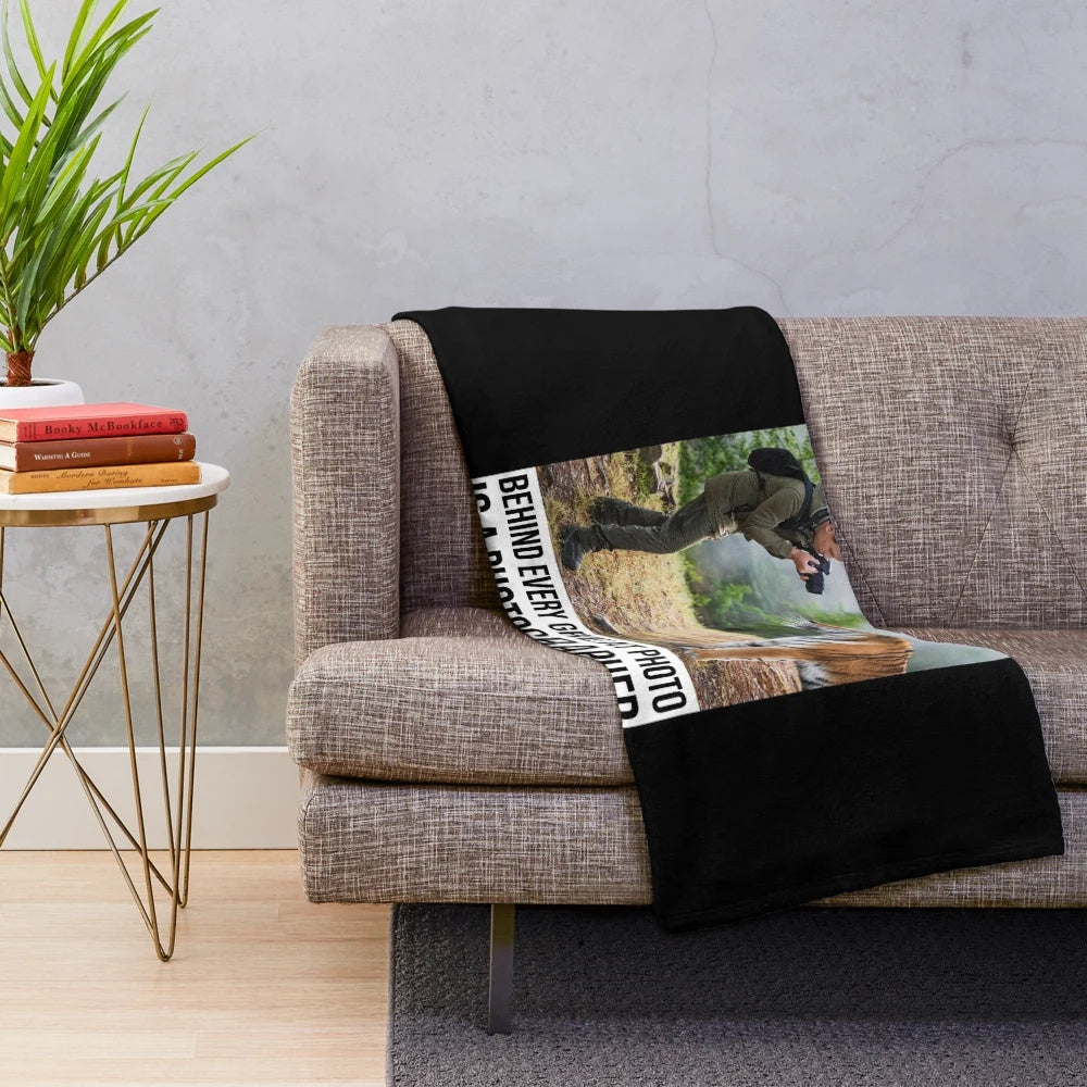 Photography plush blanket with text "Behind every great photo is a photographer who almost missed it