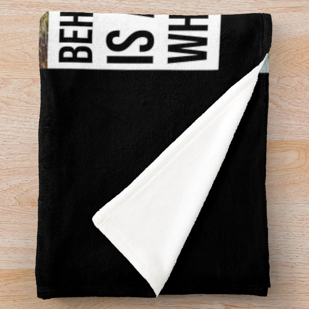 Photography plush blanket with text "Behind every great photo is a photographer who almost missed it