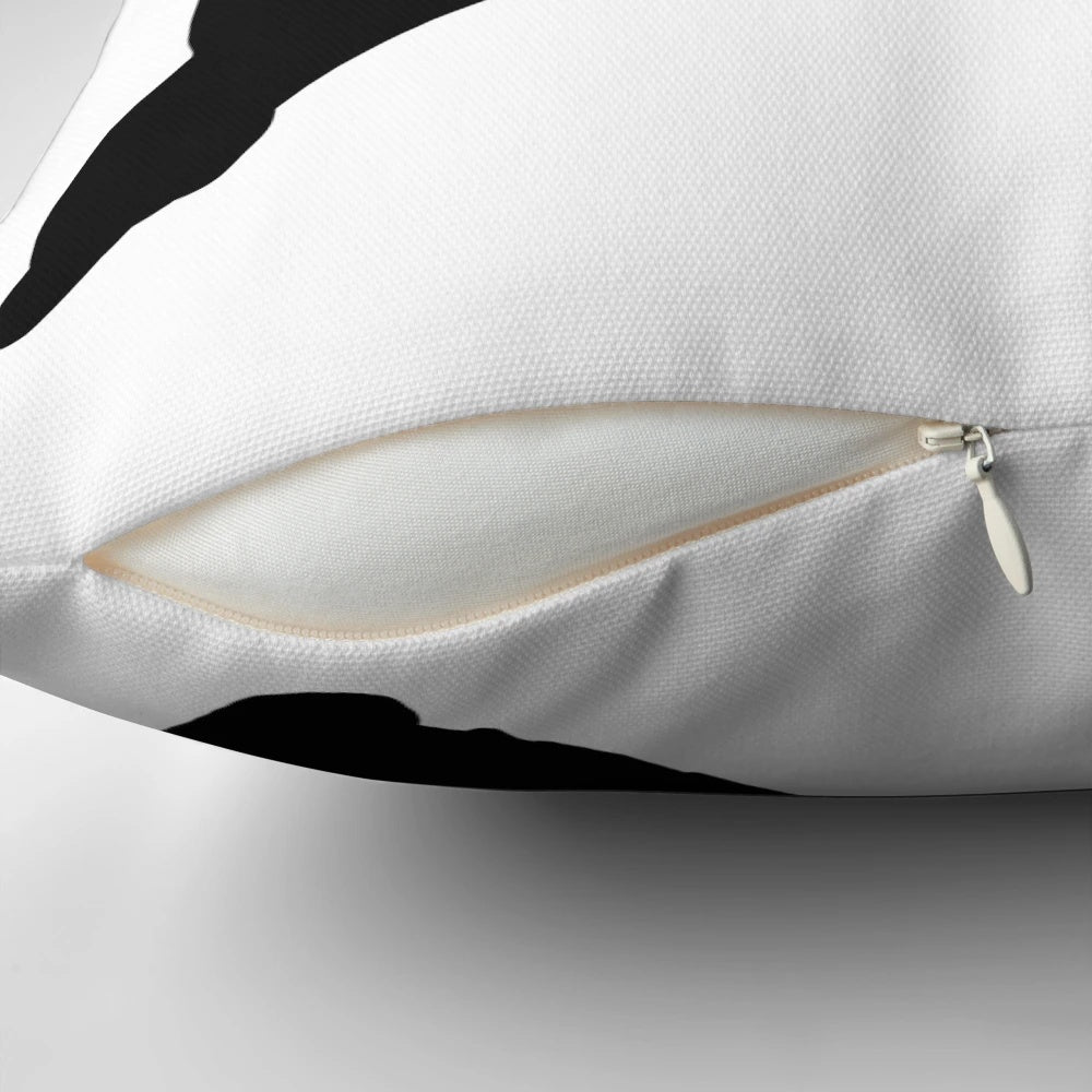 A black and white silhouette throw pillow featuring the lyrics "Photosynthesis" by Frank Turner.