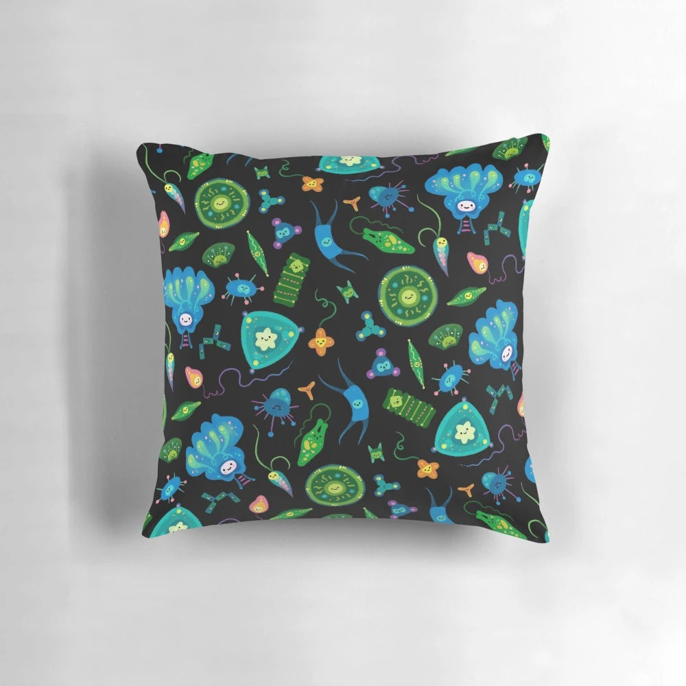 Decorative pillow featuring a pattern of phytoplankton and other microscopic ocean organisms