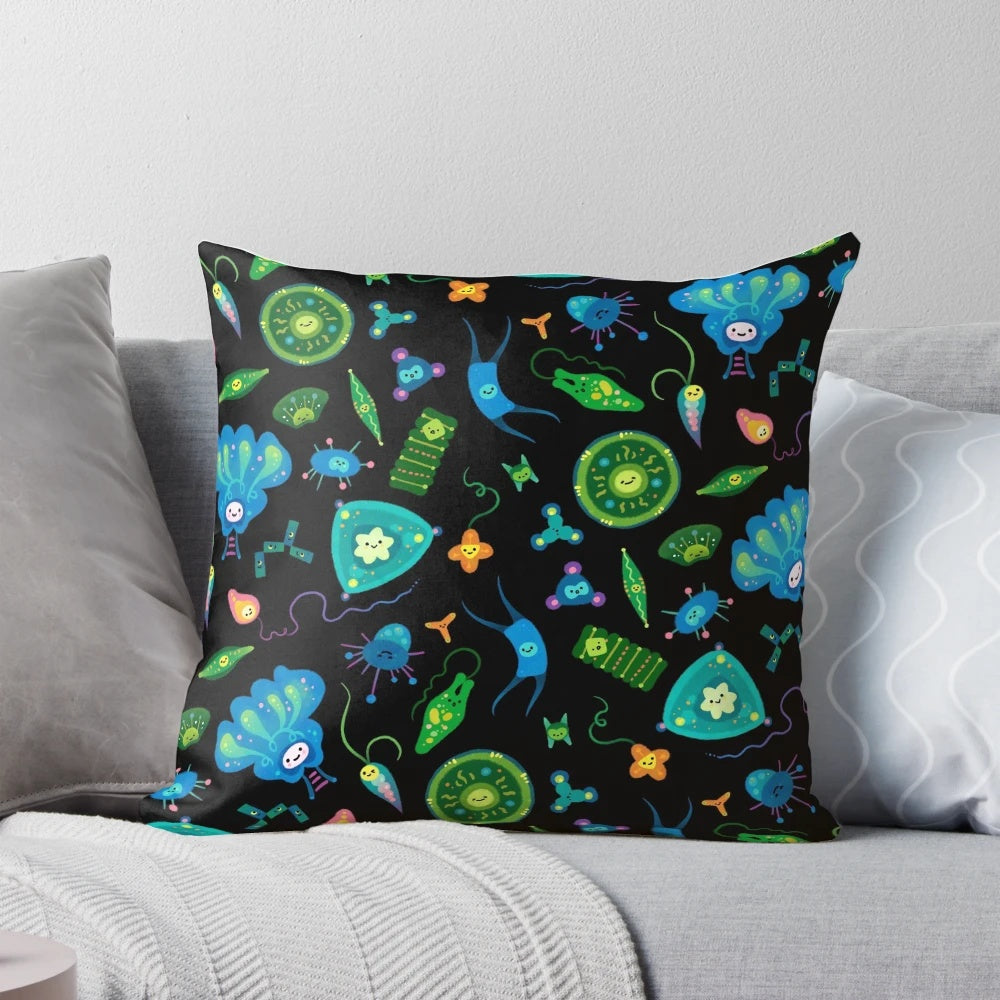 Decorative pillow featuring a pattern of phytoplankton and other microscopic ocean organisms
