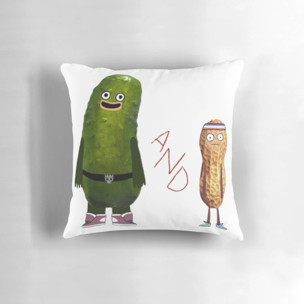 Whimsical pickle and peanut cartoon design on a plush, comfortable pillow for adding nature-inspired humor to your home.